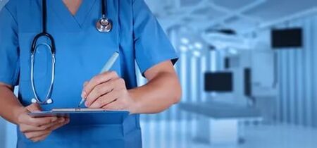 Doctor treats varicose veins on the legs
